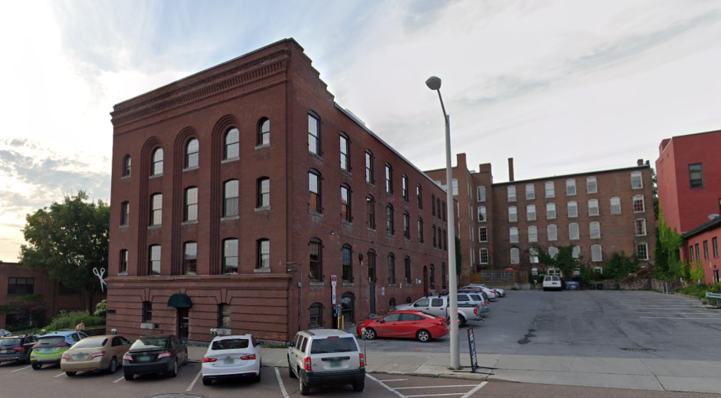 Street view of large brick office building, Main Street, Burlington, VT