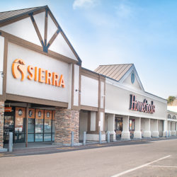 Shopping plaza storefronts of Sierra Trading Post and Homegoods