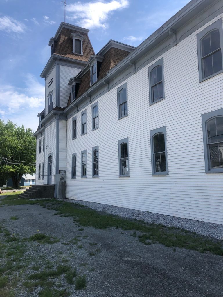 Exterior of historic white building Main Street Enosburg, Vermont
